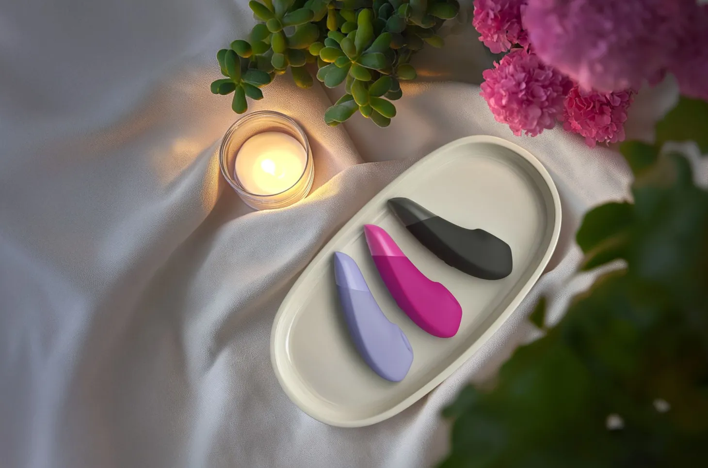 Womanizer Enhance - Duo clitoridien air et vibration - Rose